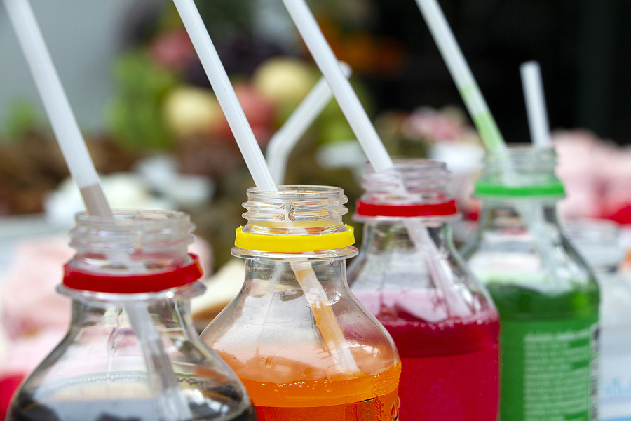 Colourful Sugar Sweetened Beverages with white straws
